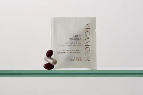 Vegamour GRO+ Advanced Hair Growth & Density Supplements package with capsules lined up