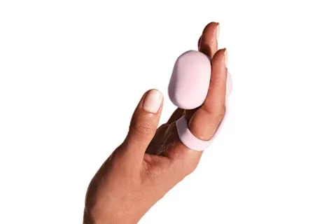 Dame Fin vibrator on hand