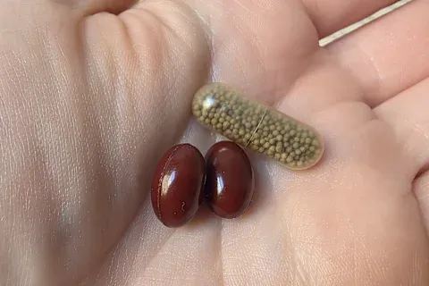 Vegamour capsules in hand