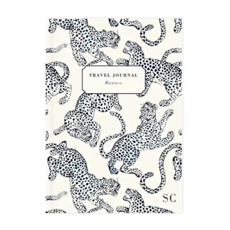 white journal with jaguar pattern on cover