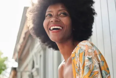 Happy Afro Curly Hair Woman.