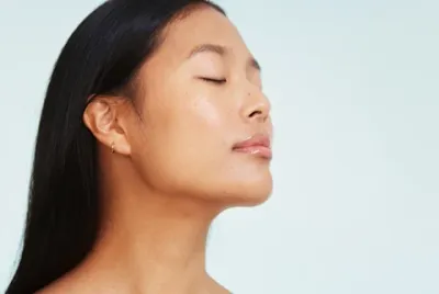 Young Asian woman side profile with sharp jawline