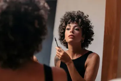 Young Woman Applying Mascara