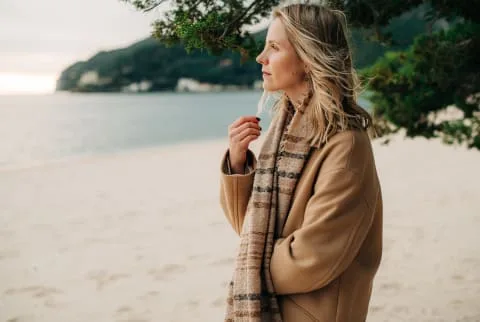 woman outdoors thinking woman outdoors thinking