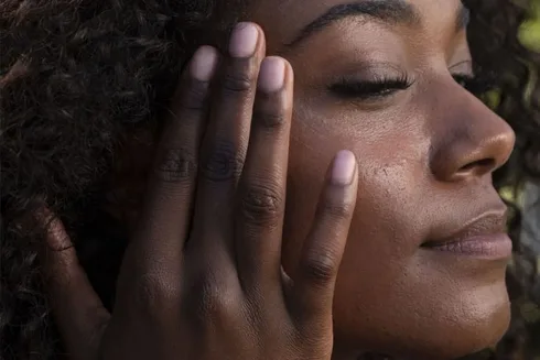 Woman Applying Lotion Woman Applying Lotion