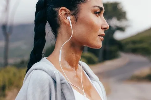 Woman Working Out and Listening to Music Woman Working Out and Listening to Music