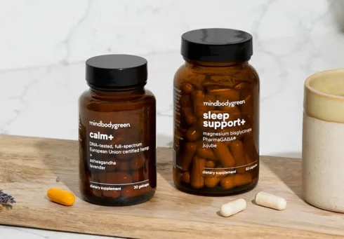 two supplement bottles side-by-side, in soothing bathroom two supplement bottles side-by-side, in soothing bathroom