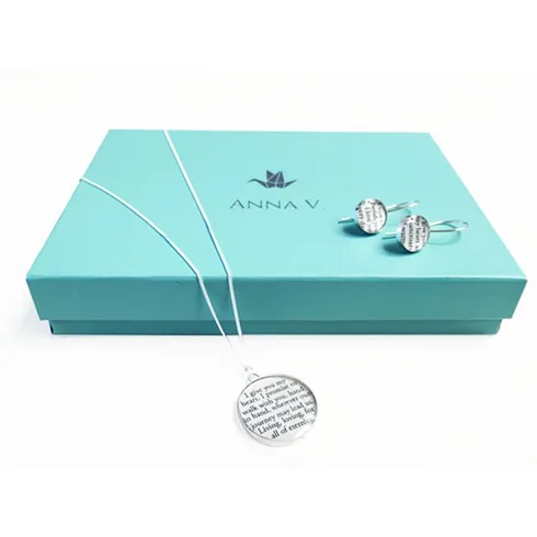 paper necklace over light blue box paper necklace over light blue box